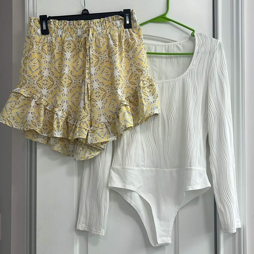 Boutique, bodysuit, and shorts